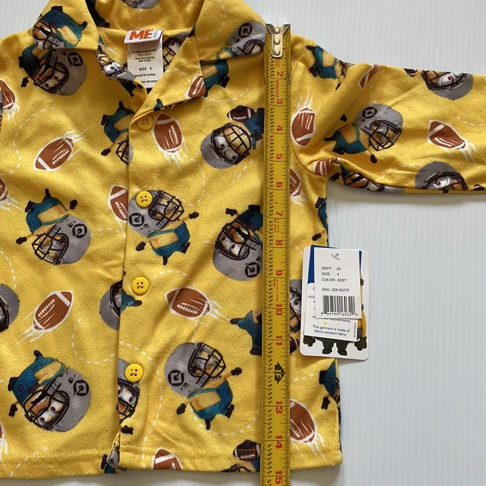Minions yellow football pajama top & bottoms.  Size 4